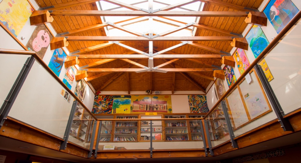 Tamariki School: The main hall atrium and library.